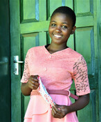 Elinette, 19, with one of the reusable sanitary pads she made